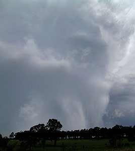 Rear of storm with hail shaft and hail scud